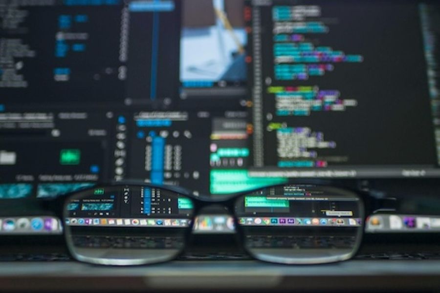 Someone sitting at a computer.