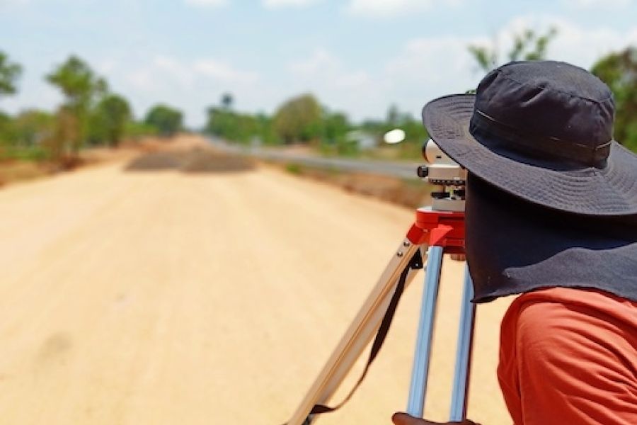 person looking through a survey and mapping tool. 